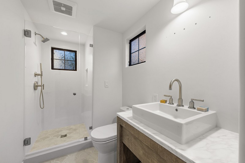 Walk-in glass shower remodel — Carmel-by-the-Sea Bathroom remodel with frameless glass walk-in shower and modern vessel sink in Carmel-by-the-Sea