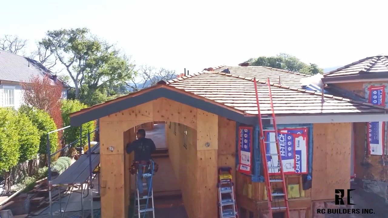 Home addition framing — Monterey Peninsula RC Builders crew framing and roofing a home addition on the Monterey Peninsula
